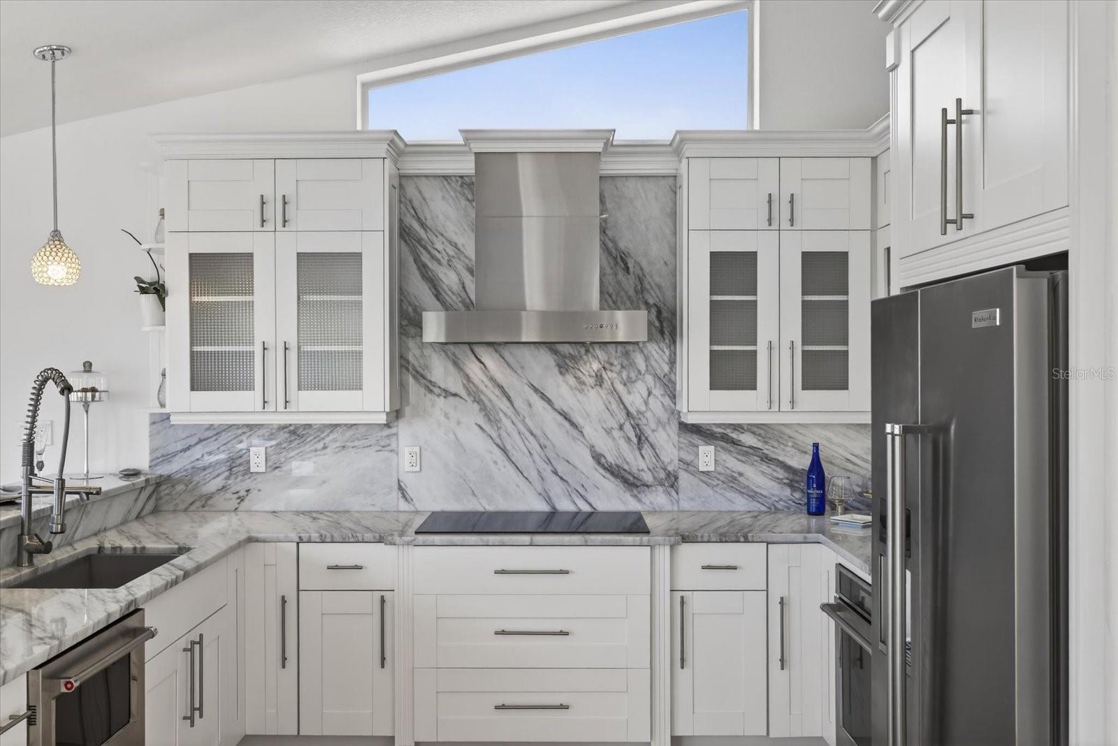 Elegant gourmet kitchen with quartz countertops