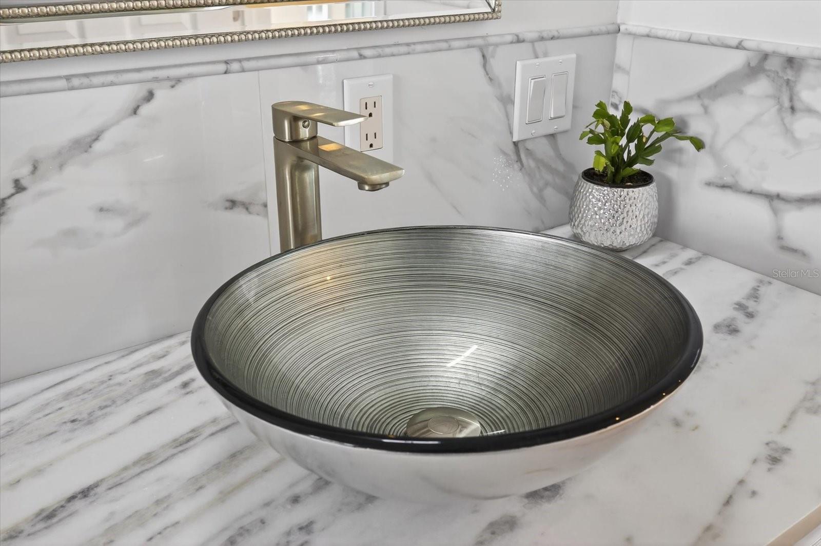 Elegant basin in guest bathroom vanity upstairs