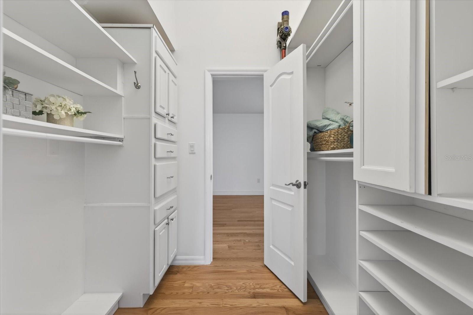 Adjoining walk in closet from bedroom 2 into Primary bedroom