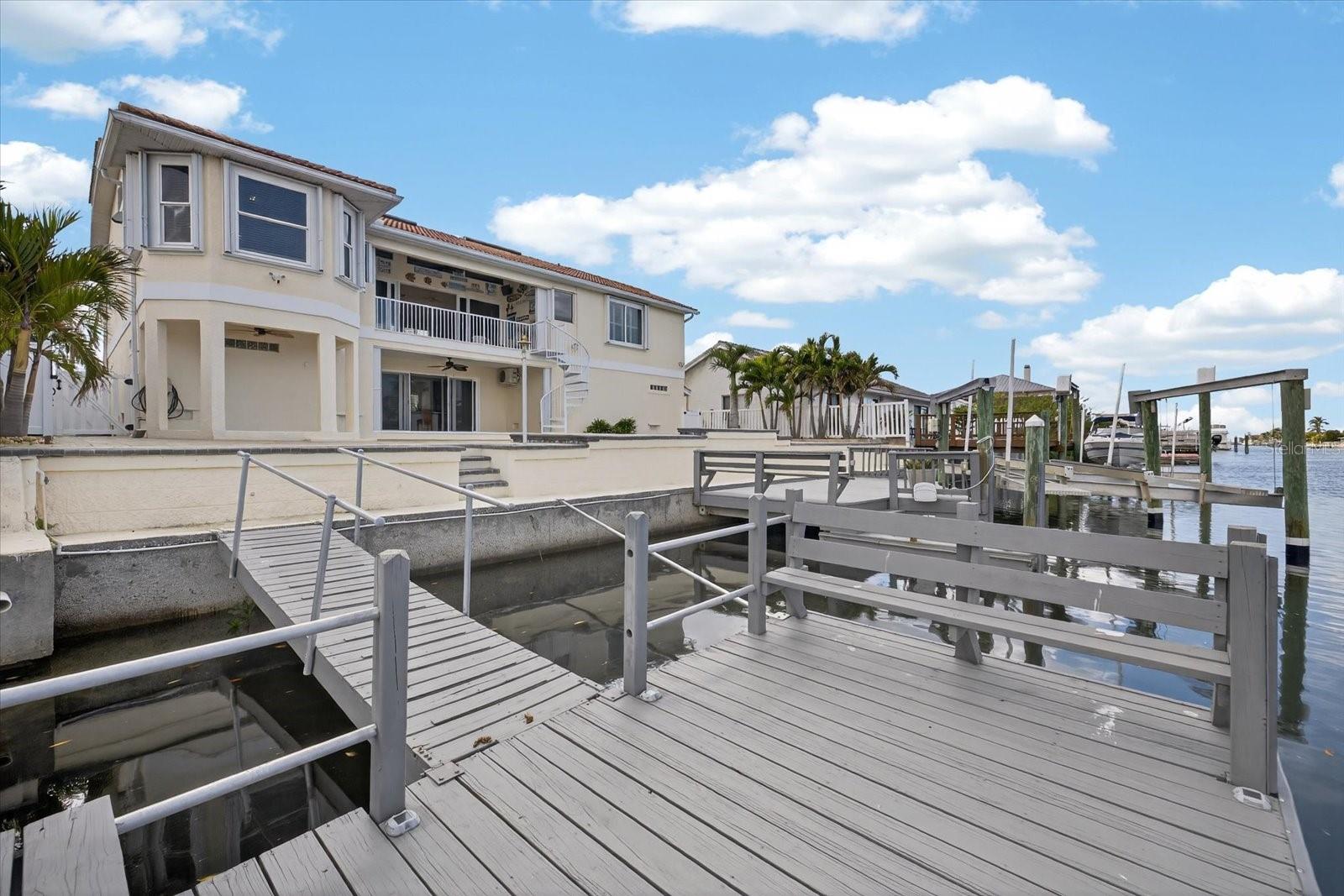 Floating dock and boat lift