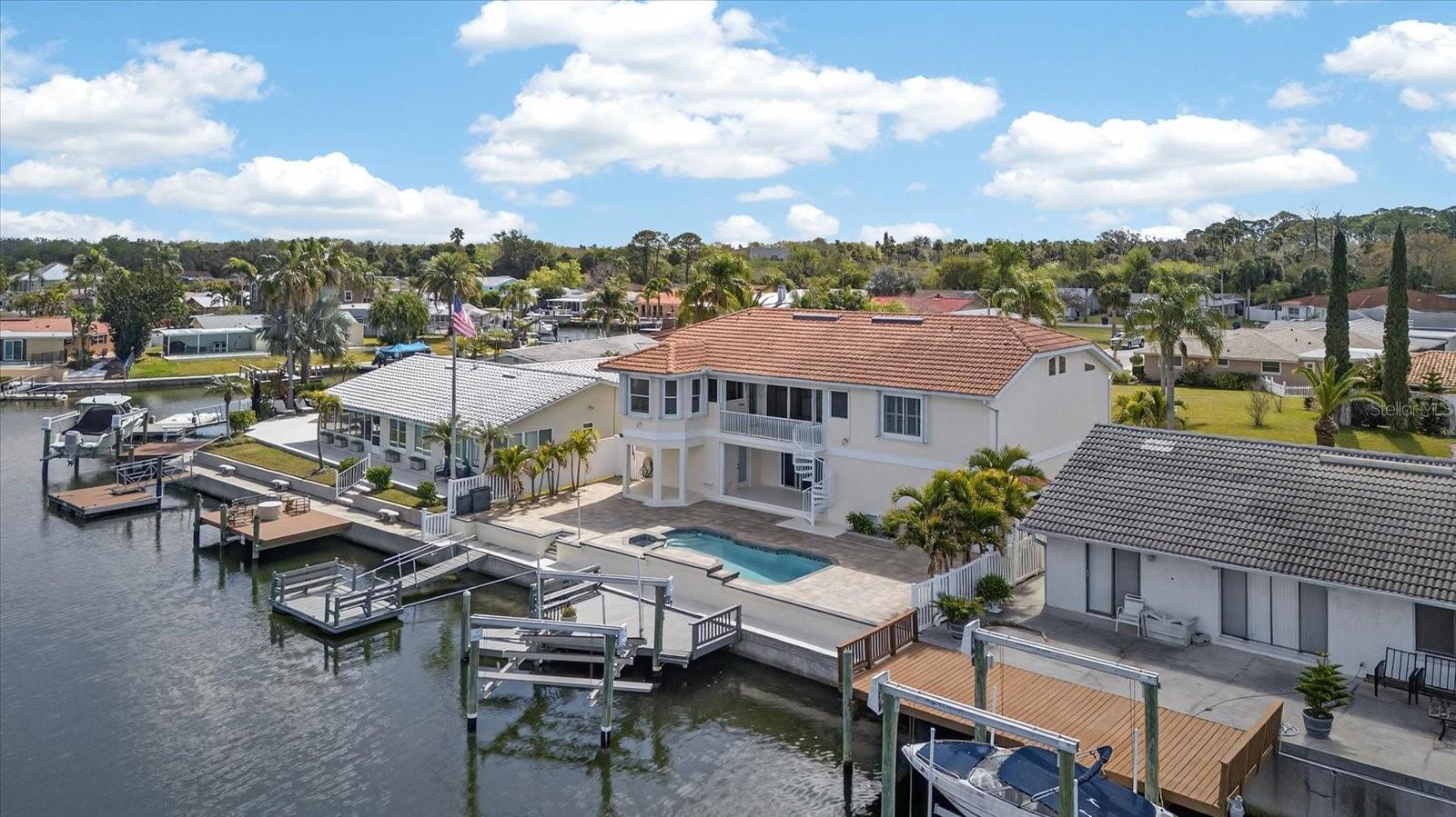 Looking Southeast into back of home from the water.