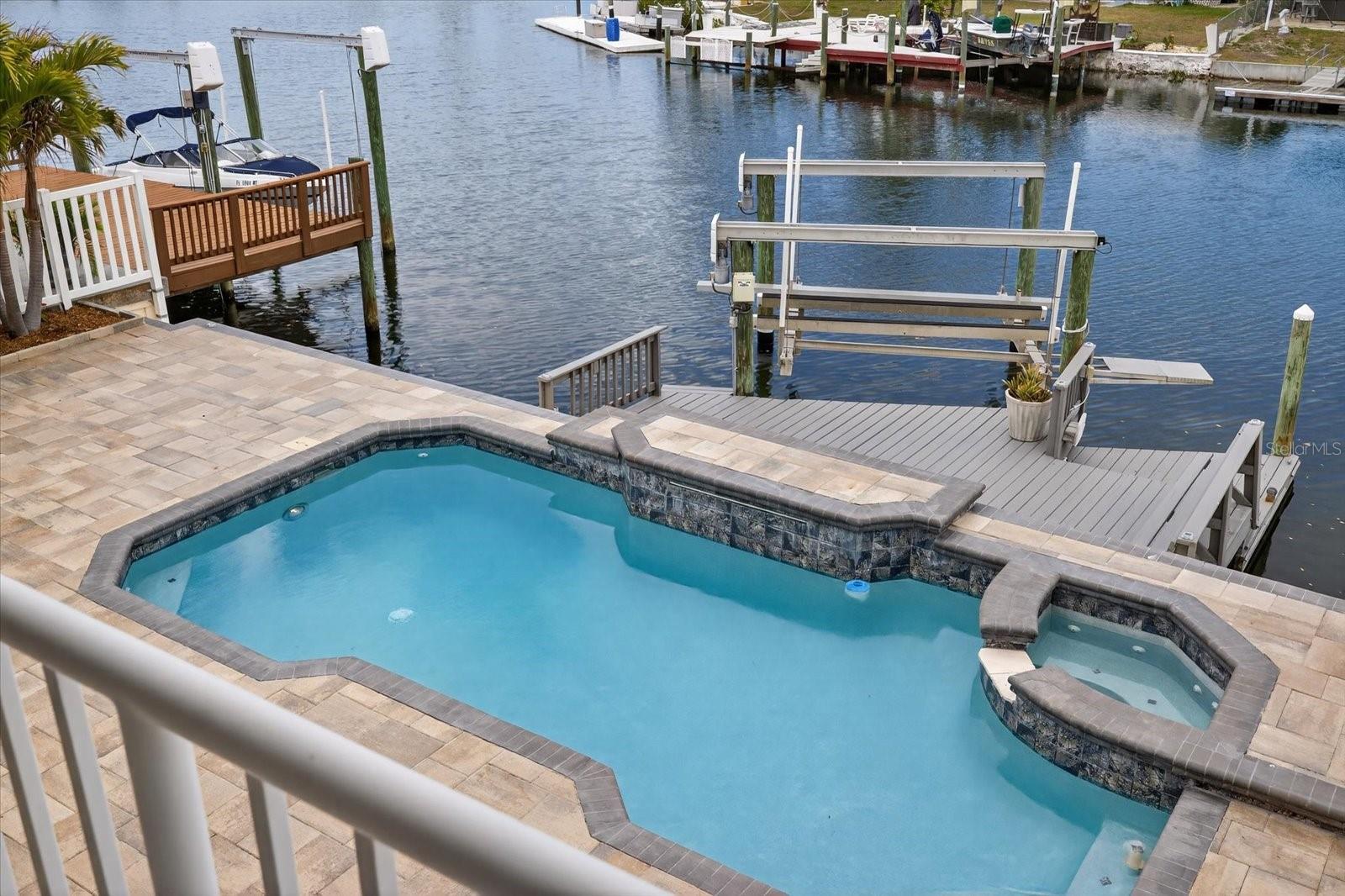 Upper balcony pool/spa and deep Gulf channel views.