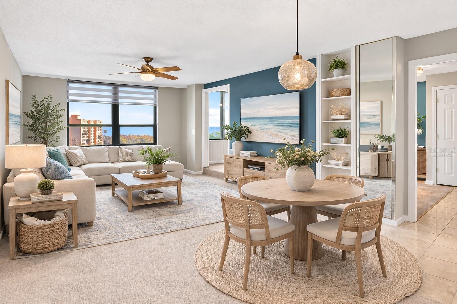 Virtually staged. Open living room/dining room area with beautiful views of Tampa Bay!