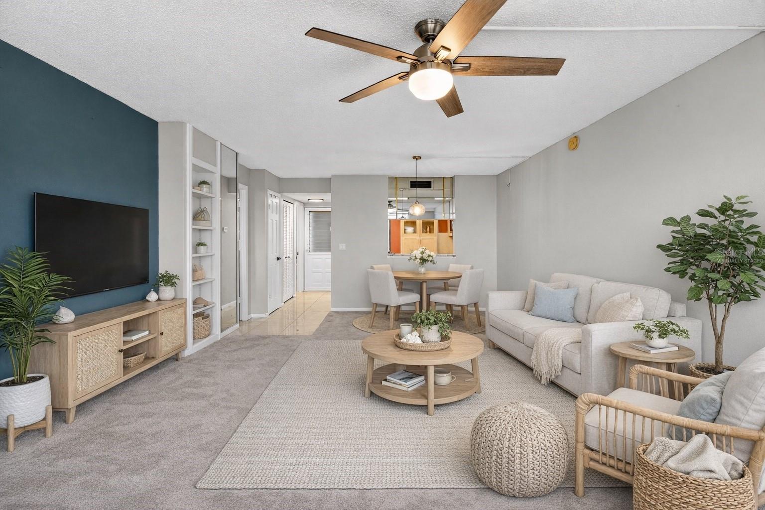 Virtually staged. Living room/dining room