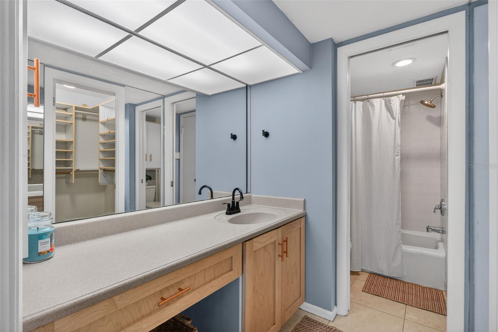 Ensuite bathroom with large vanity area and walk in closet!
