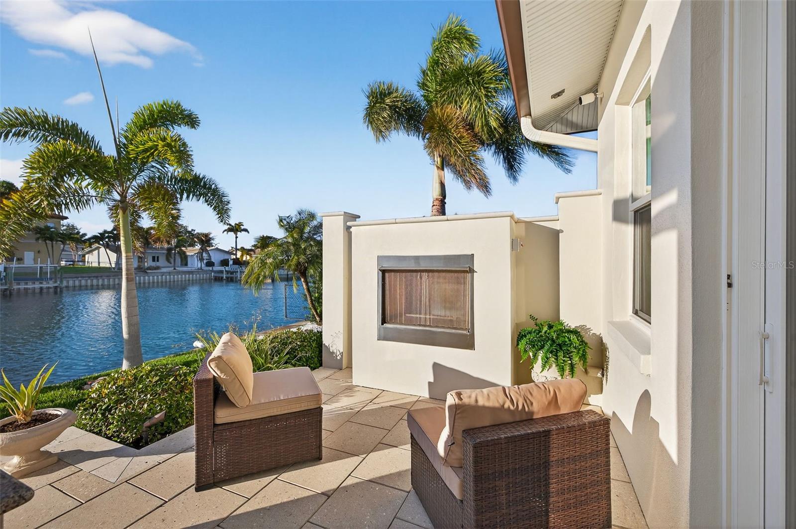 Outdoor fireplace off of the primary bedroom.