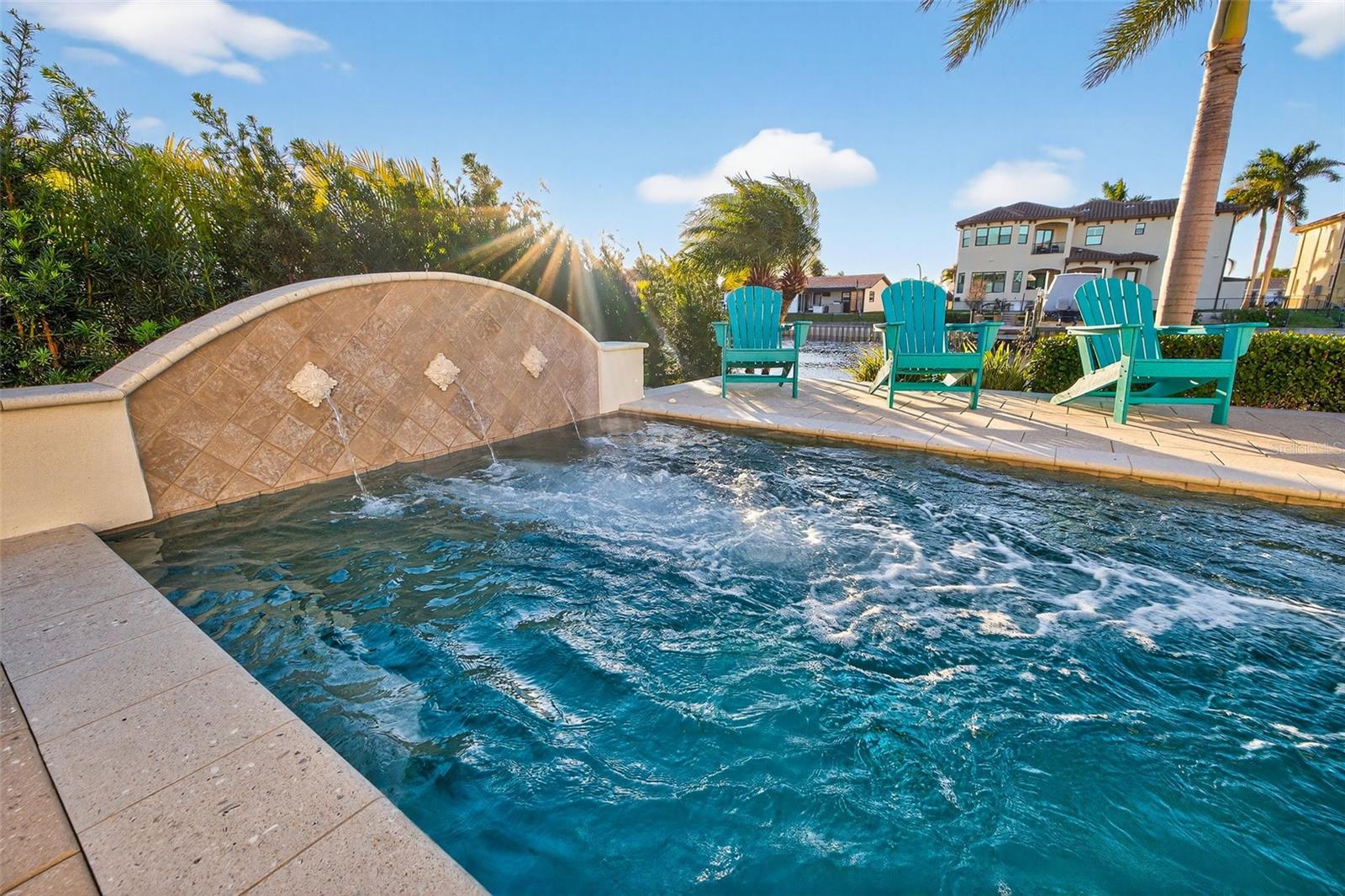 Saltwater pool with swim jets, programmable and customizable  LED lights, automatic pool filler, water feature and sun deck. Pre-plumbed for a heater.