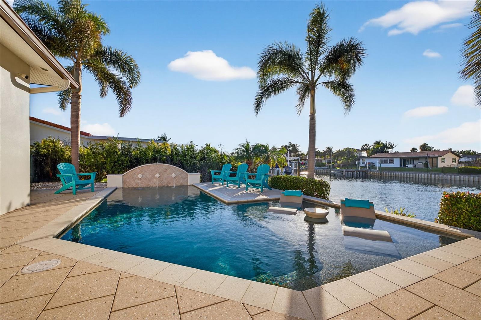 Saltwater pool with swim jets, programmable and customizable  LED lights, automatic pool filler, water feature and sun deck. Pre-plumbed for a heater.