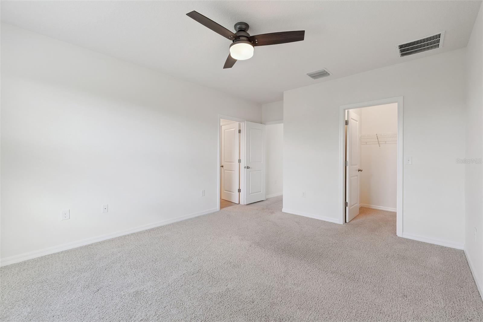 Primary Bedroom with Walk-In Closet
