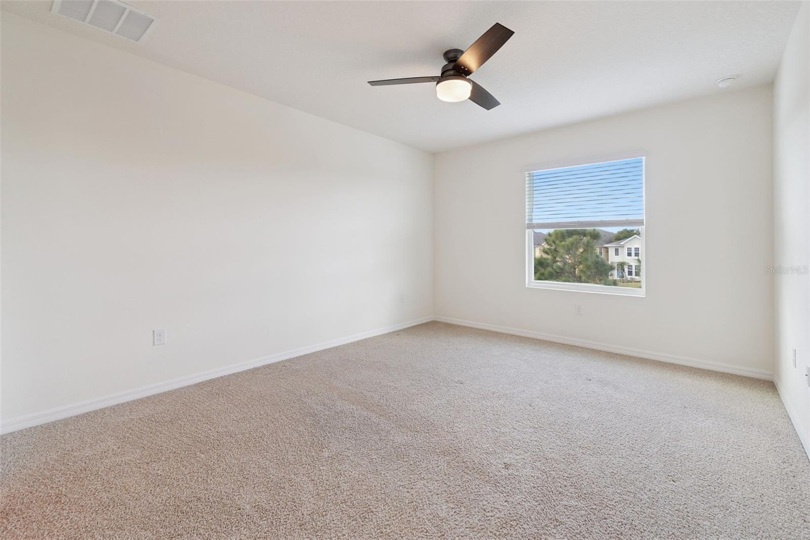 Primary Bedroom with Walk-In Closet