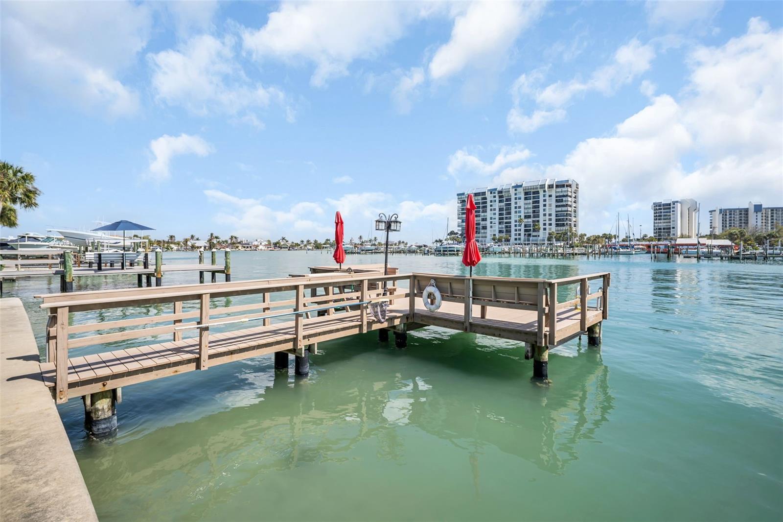 Enjoy a front-row seat to coastal living with this private dock perfect for fishing, cleaning your catch, and watching dolphins and boats pass by.