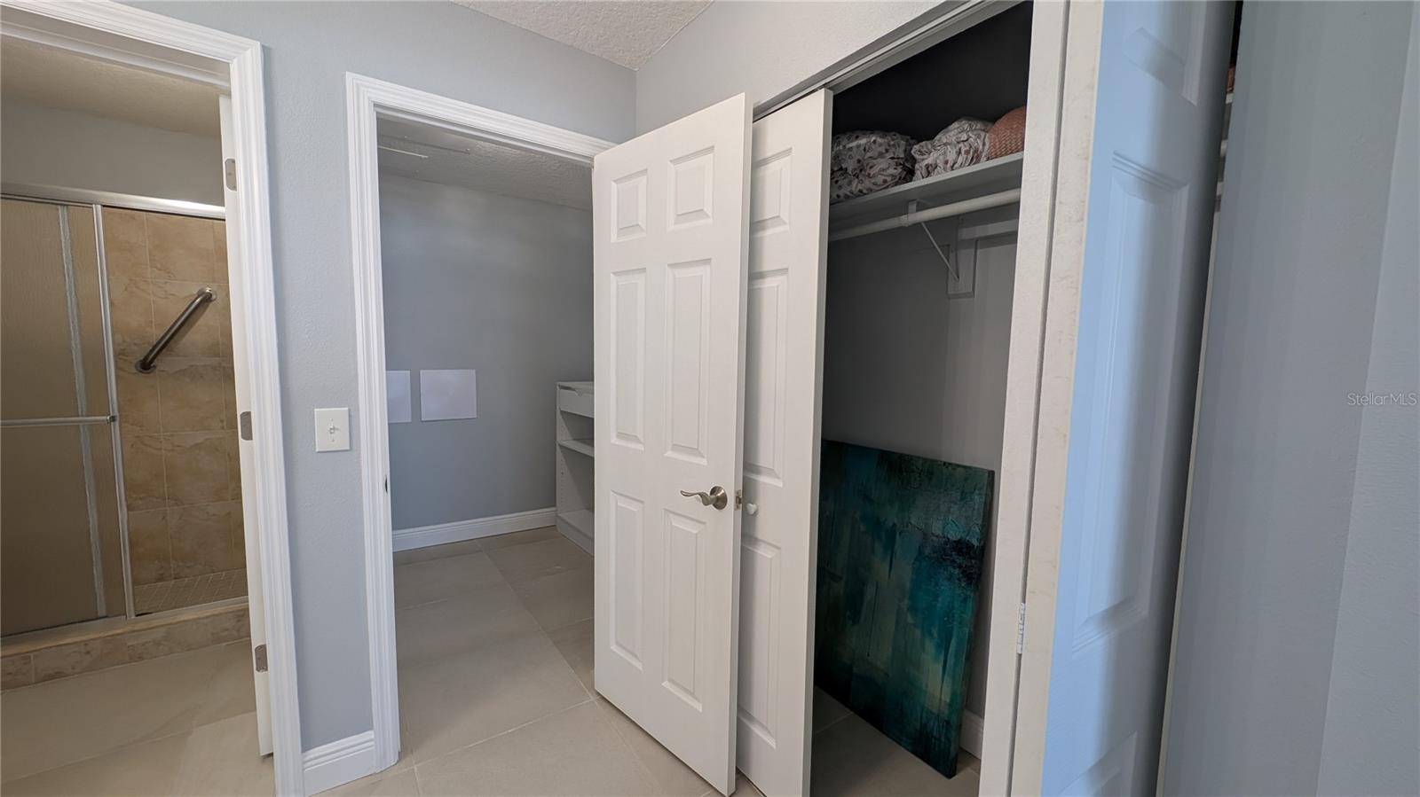 Dual closets!  1 spacious walk-in and the other is double bi-fold floor to ceiling