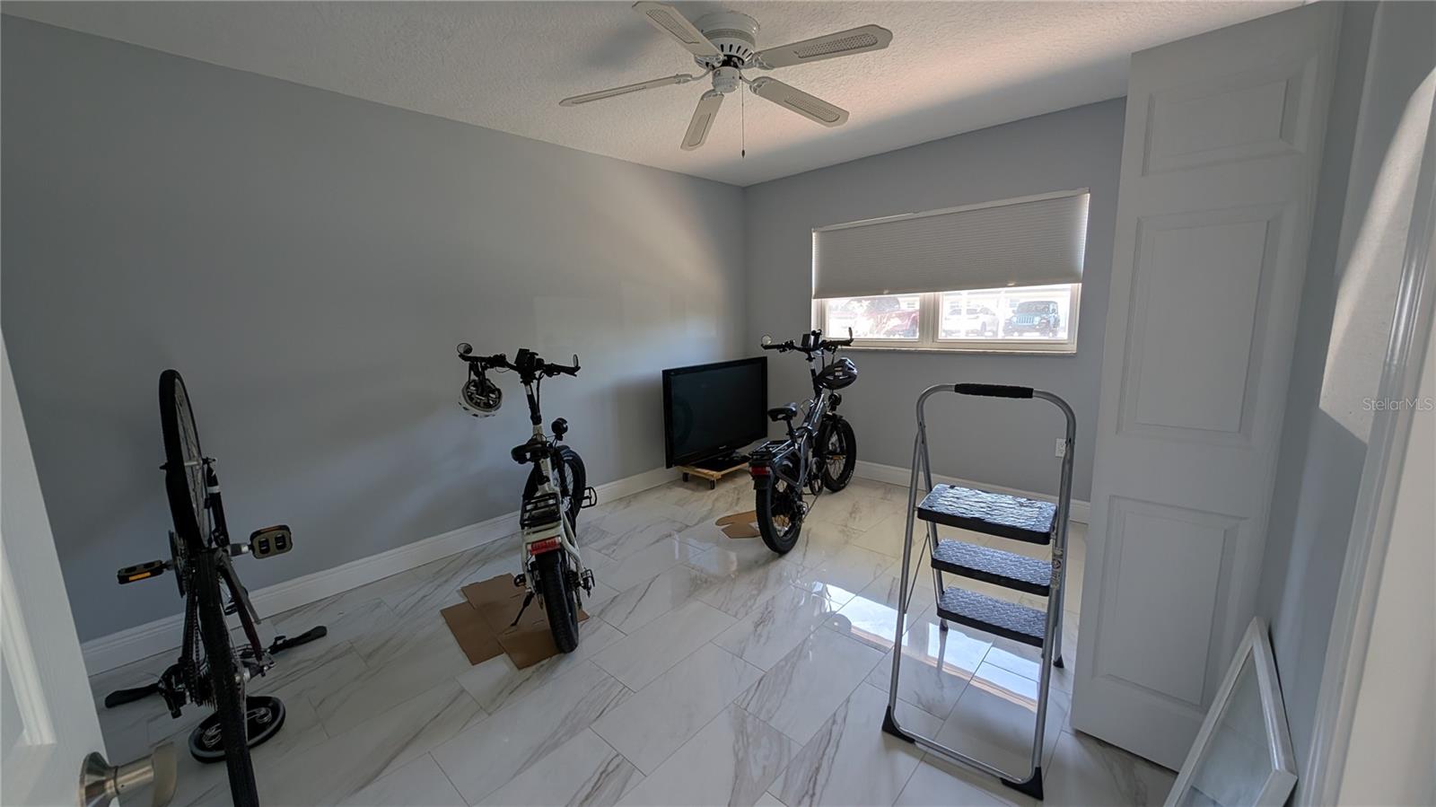Guest room with custom shades and raised panels doors throughout.  All NEW!