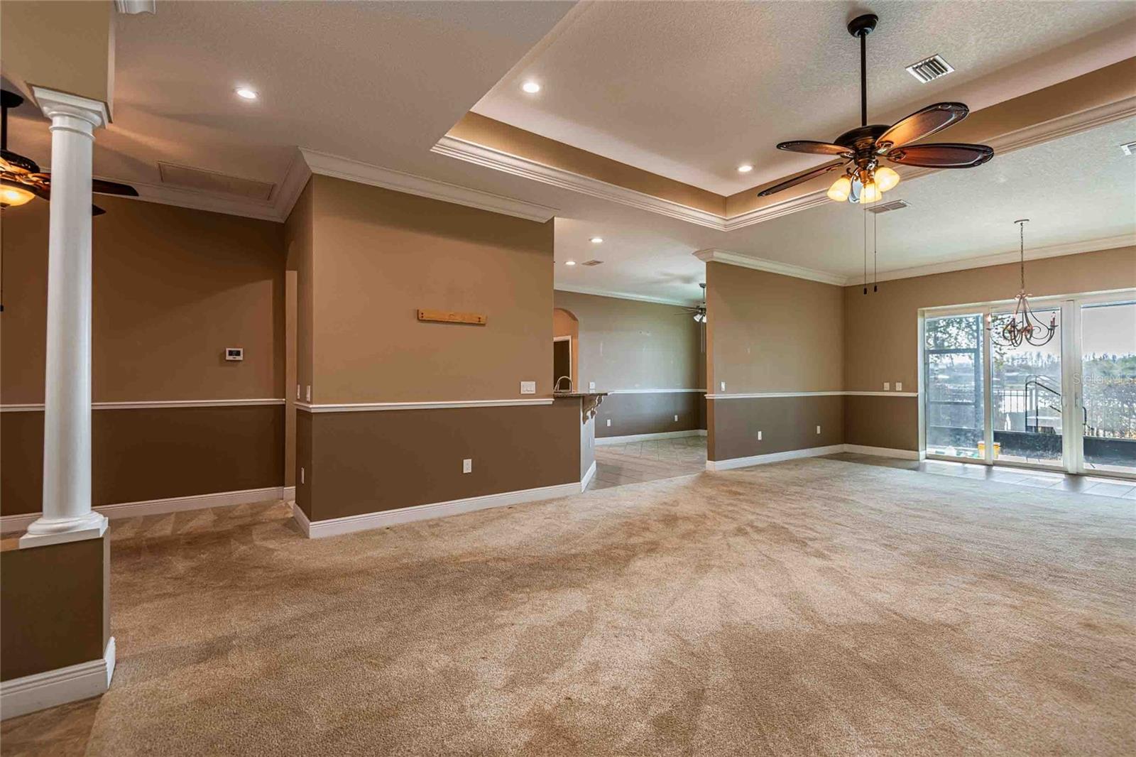 Living room with kitchen on left