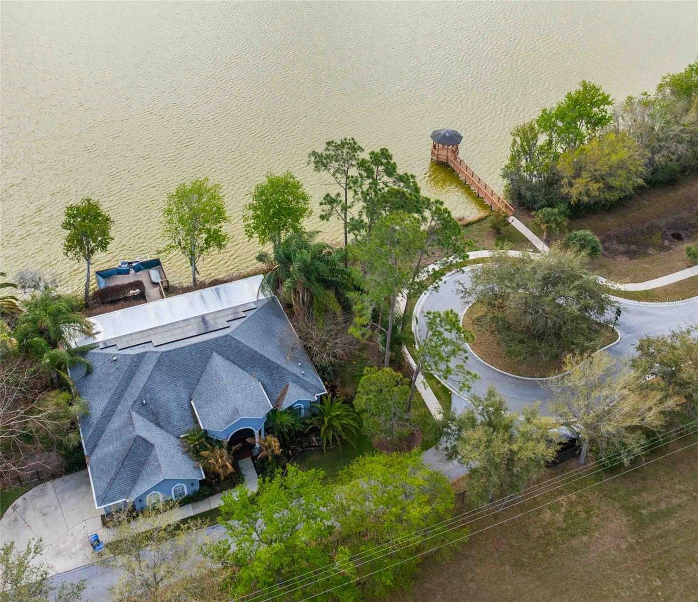 Home is located on private road from cul-de-sac.  Community dock