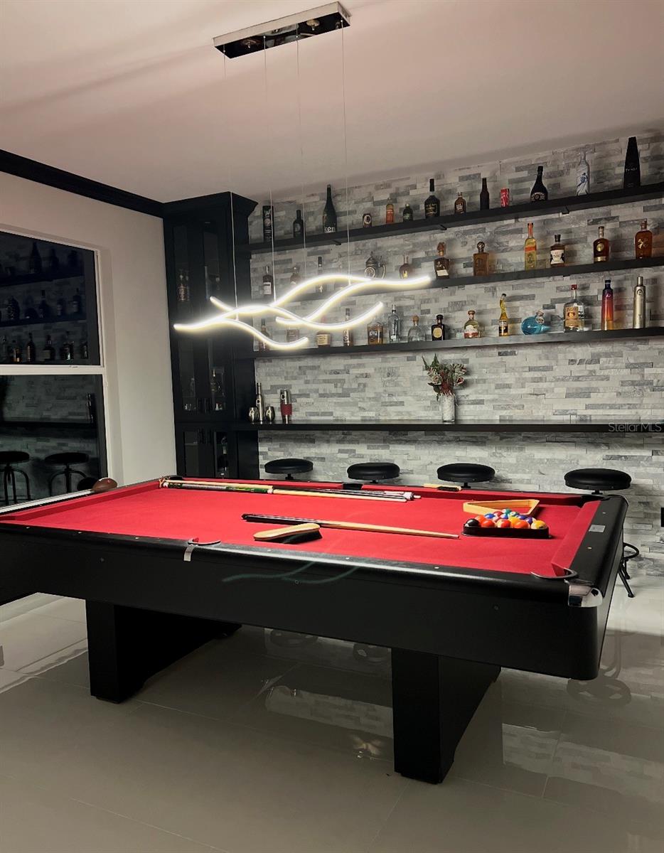 Man/Woman Cave to show that a pool table can fit.