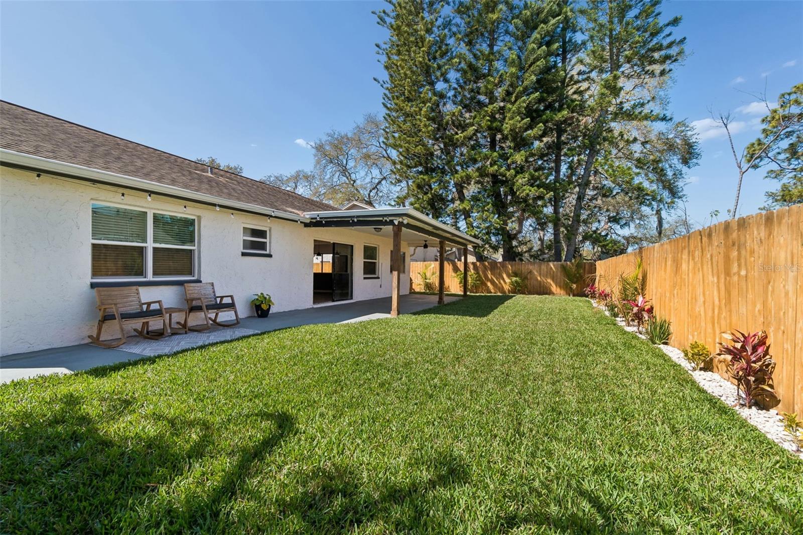 Plenty of lawn to use for playtime, gardening or for the pups to play