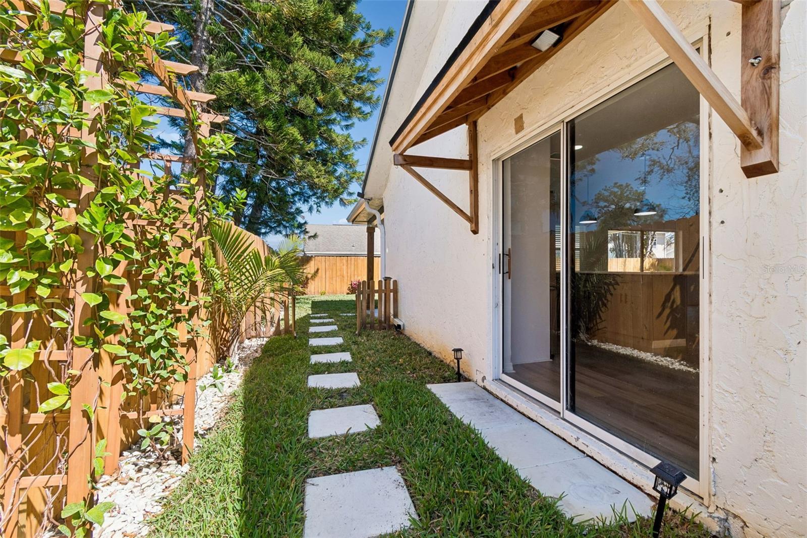 West side access to the open concept living space.