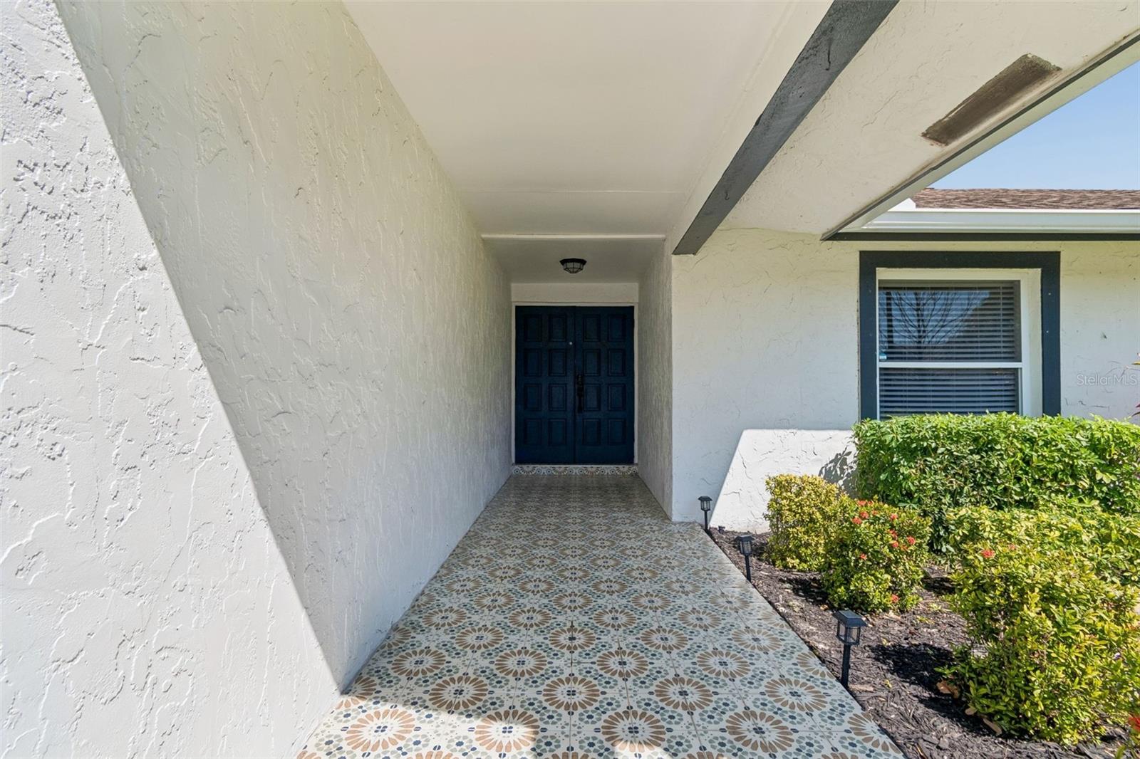 Little pop of color and style for a first impression for your guests arrival