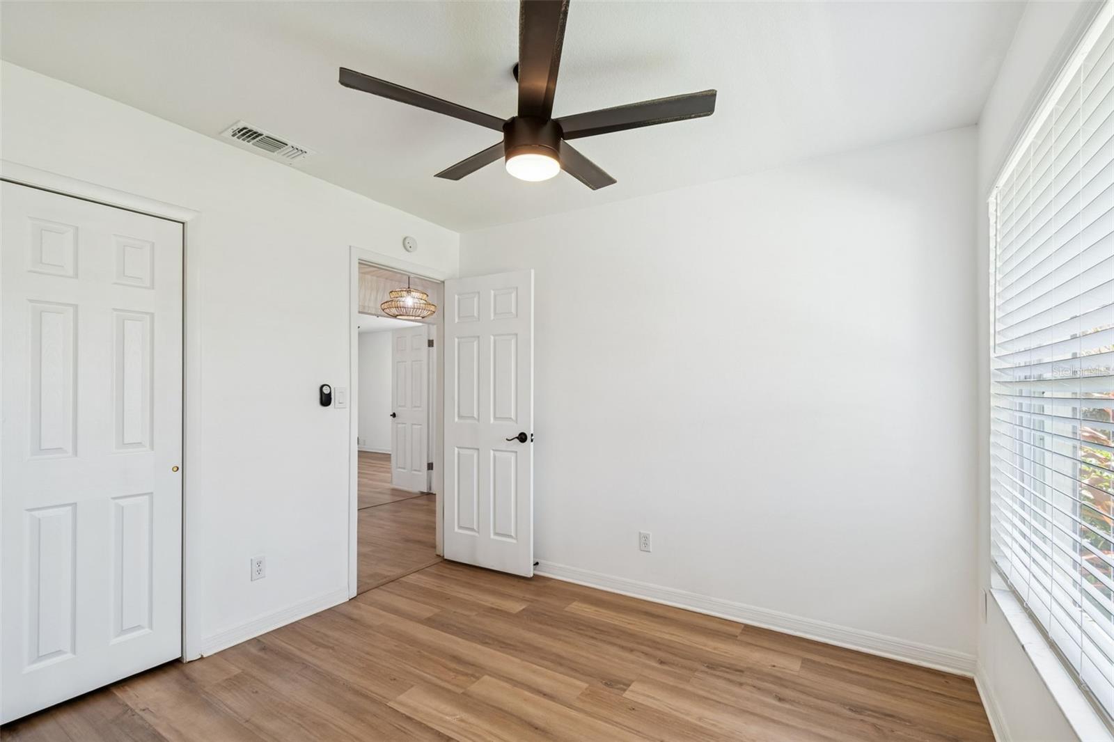 Guest Bedroom three features views of the Florida natural landscaping and a thick lawn that neighbors will fawn over.