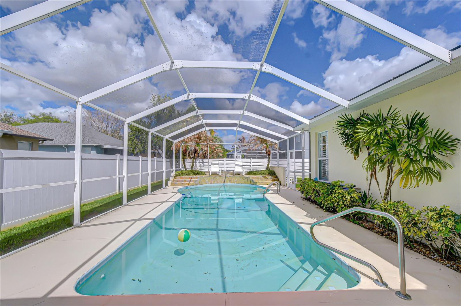 Oversized screened pool enclosure (caged pool)