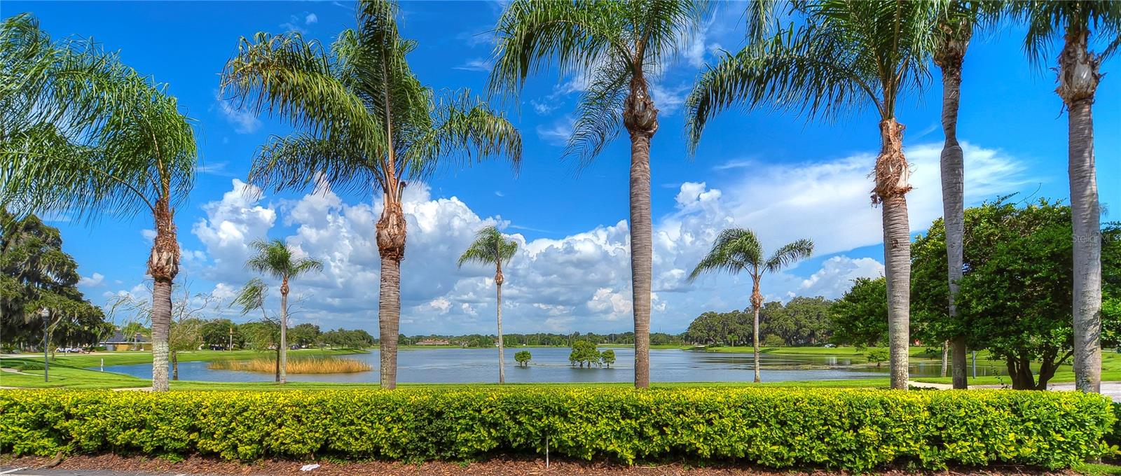 Known for serene lakes and grand oak trees