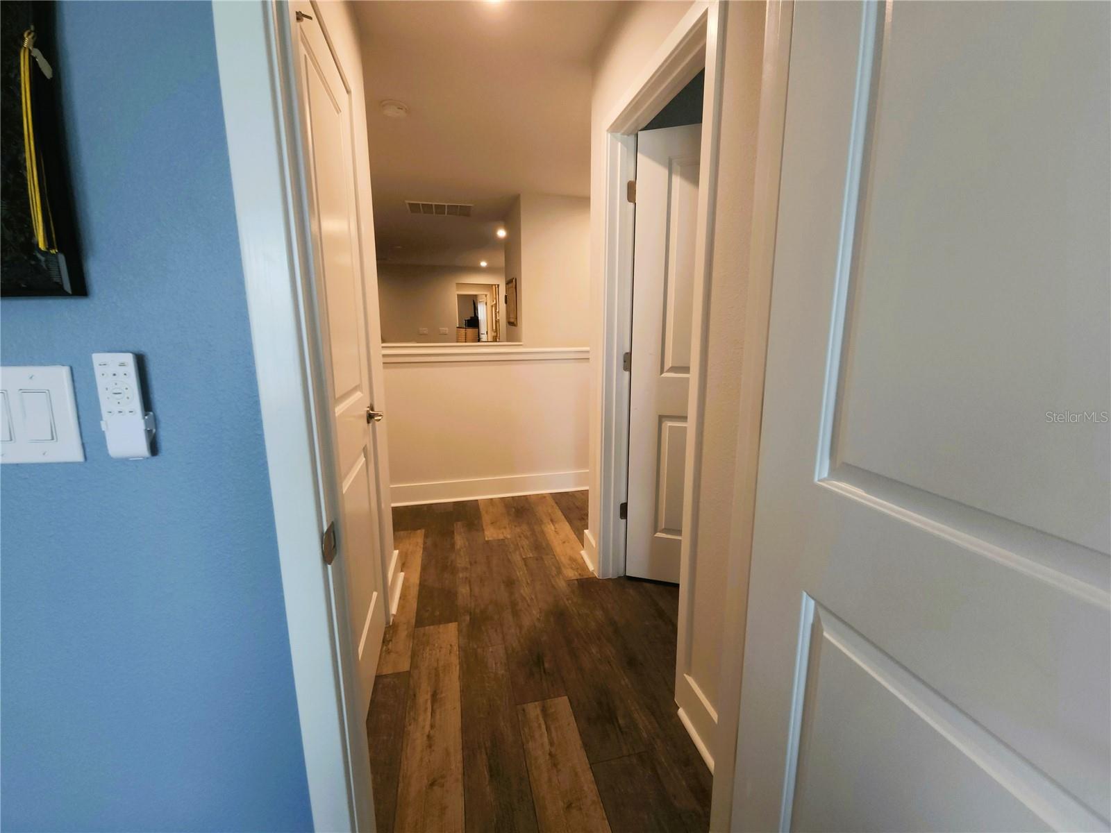 Hallway and linen closet for secondary bedrooms
