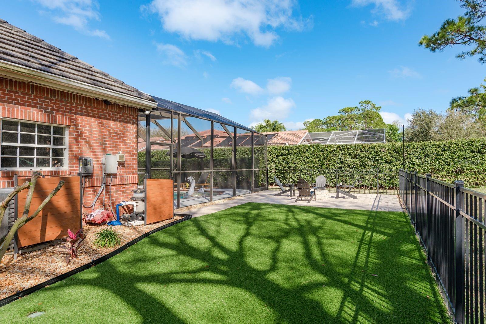 Low-maintenance turf, and a fenced area perfect for pets.