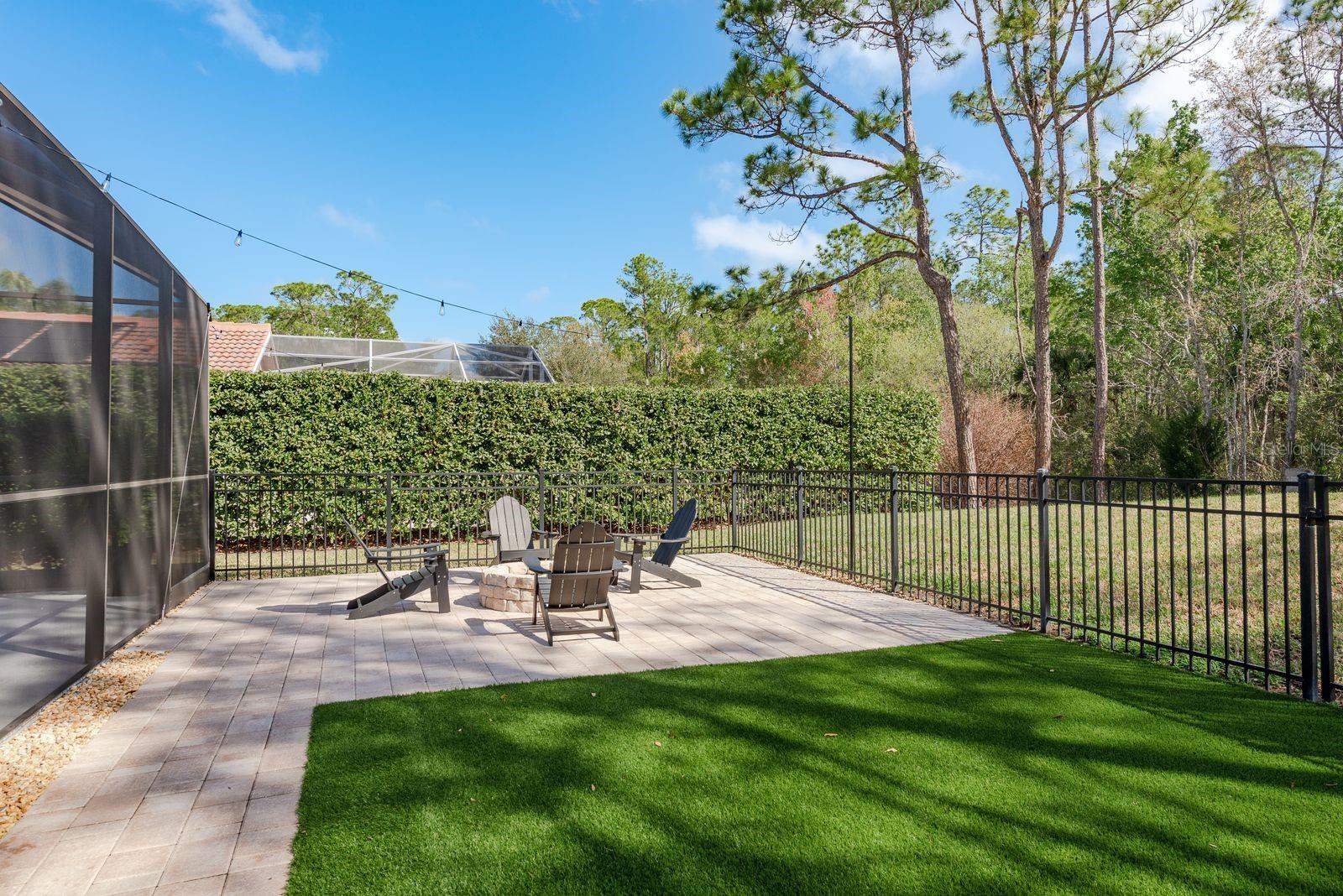 Low-maintenance turf, and a fenced area perfect for pets.