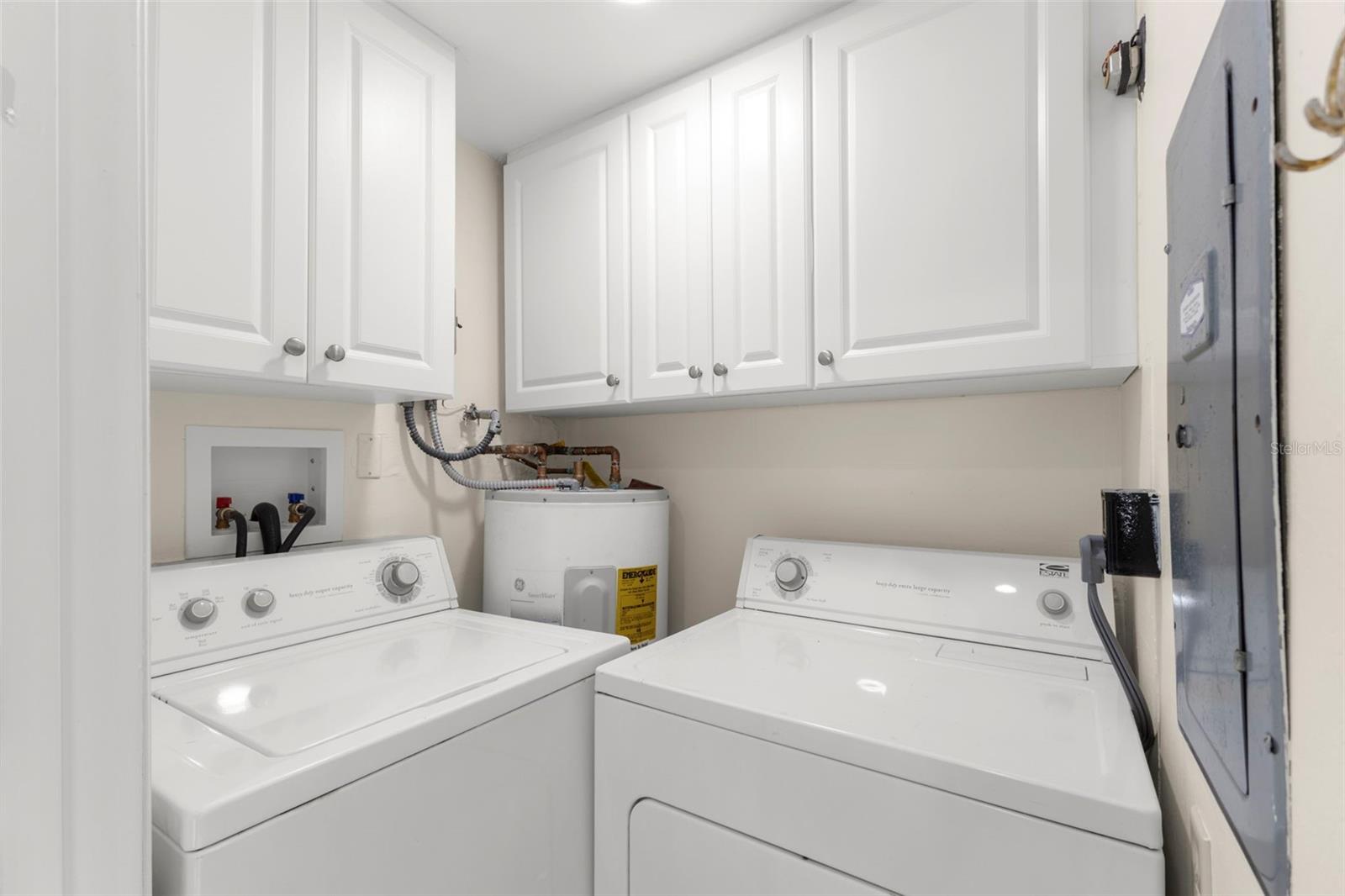 INSIDE LAUNDRY ROOM OFF OF KITCHEN