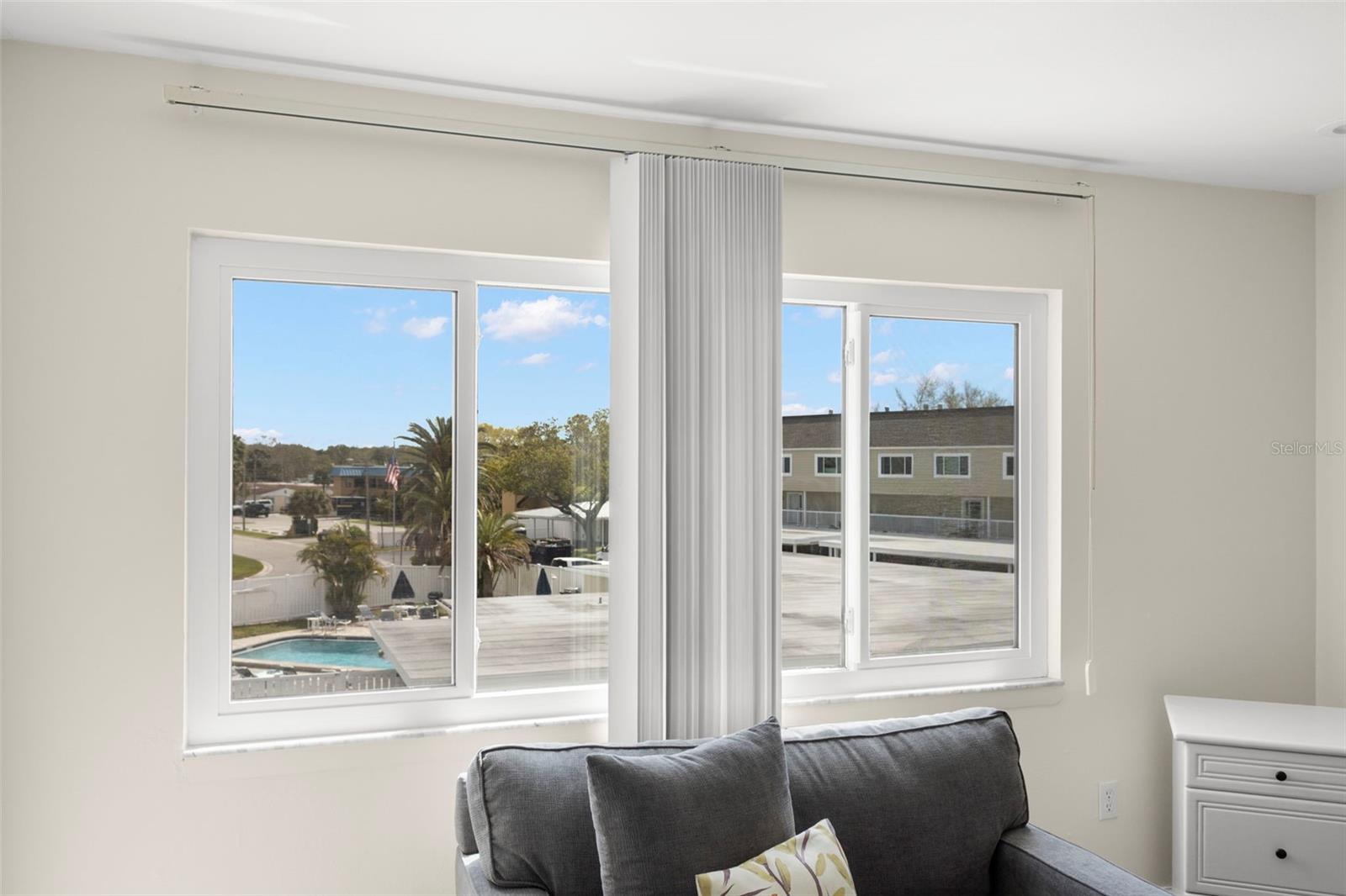 GUEST BEDROOM OVERLOOKING HEATED POOL