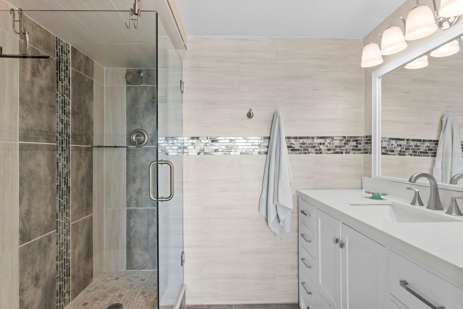 En suite bathroom walk-in shower.