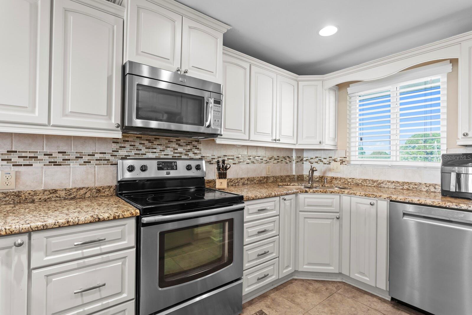 updated kitchen real wood soft close cabinets.