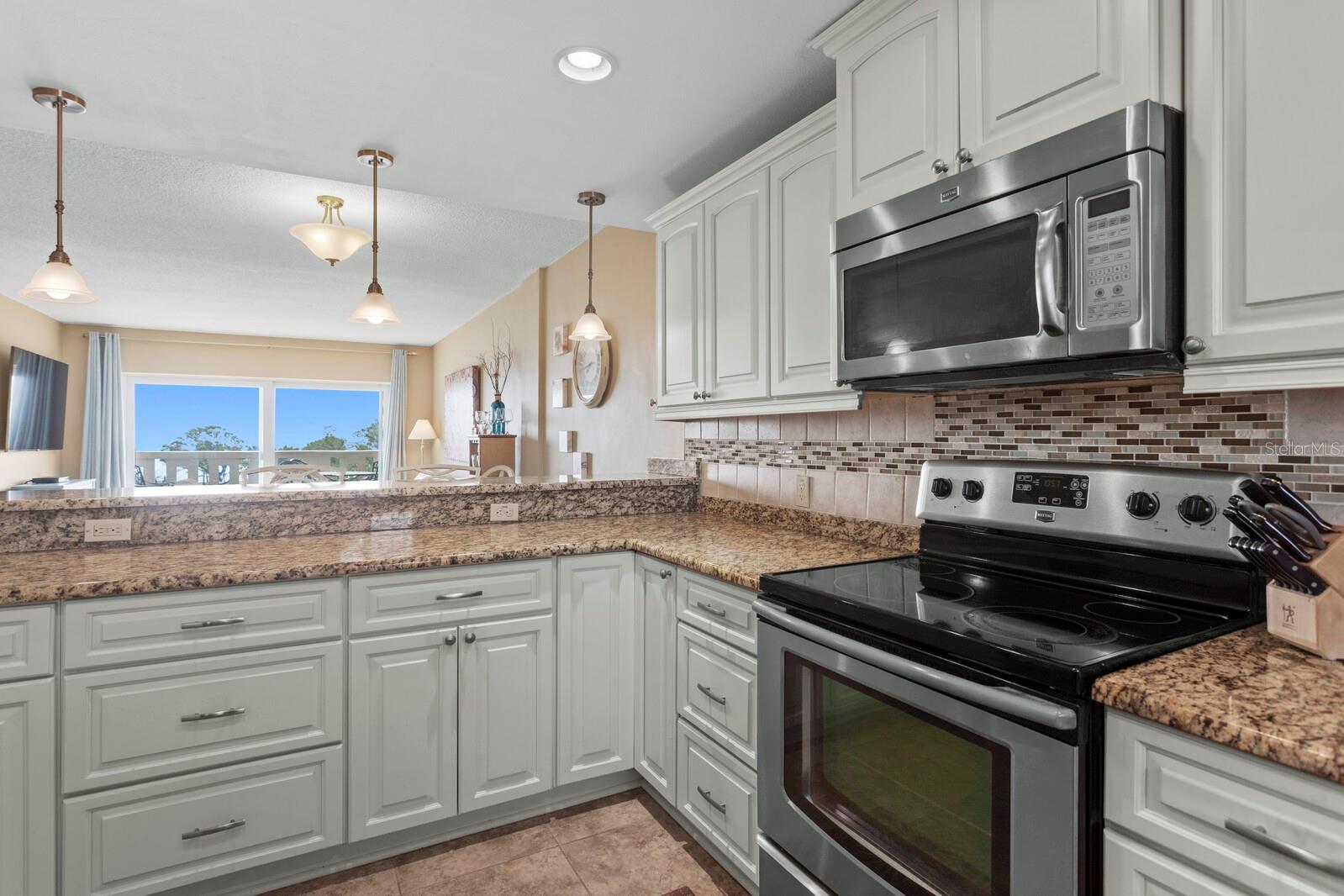Kitchen w/ceramic tile flooring.