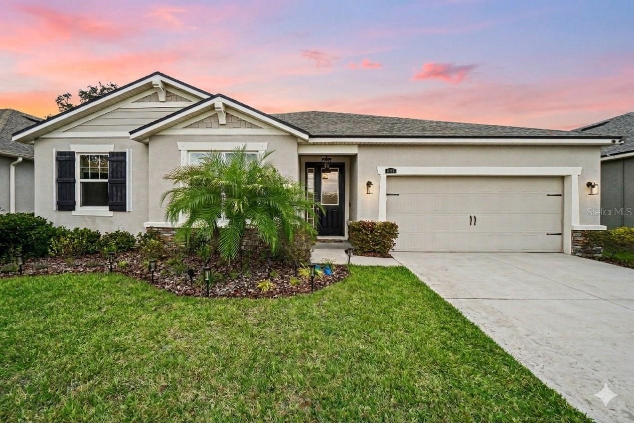 Home is larger than it looks! Open, split BR floor plan with elegant 9' Ceilings, 8' Doors