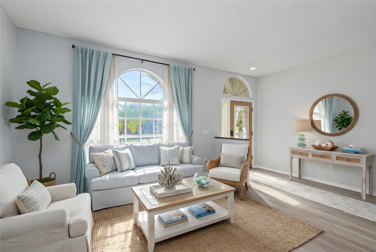 Virtually Staged - Bright and sunny front Living Room