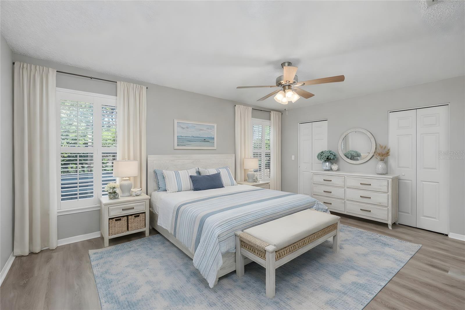 Virtually Staged - Primary Bedroom with Plantation Shutters, En Suite Bathroom and double closets