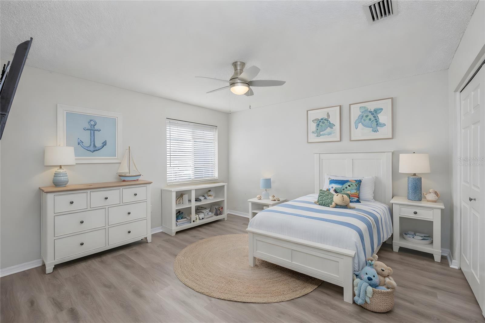 Virtually Staged - Bedroom 2, no carpet in this home and fresh paint