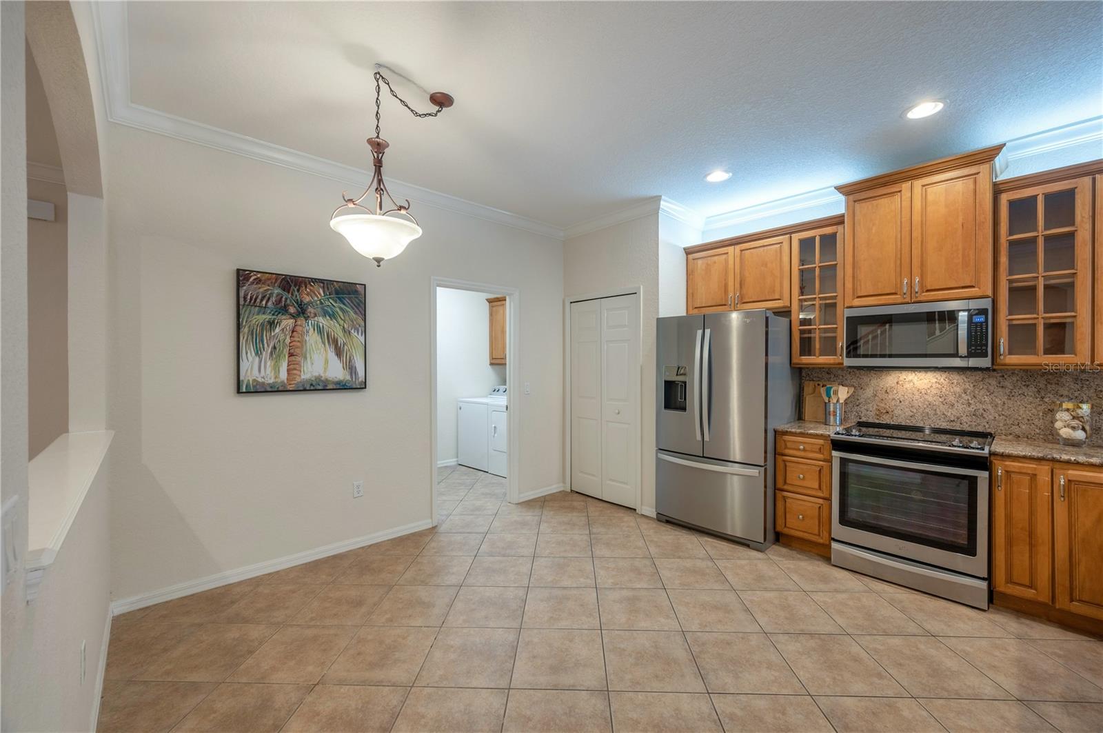 Granite Counter Tops & Glass Front Cabinetry!