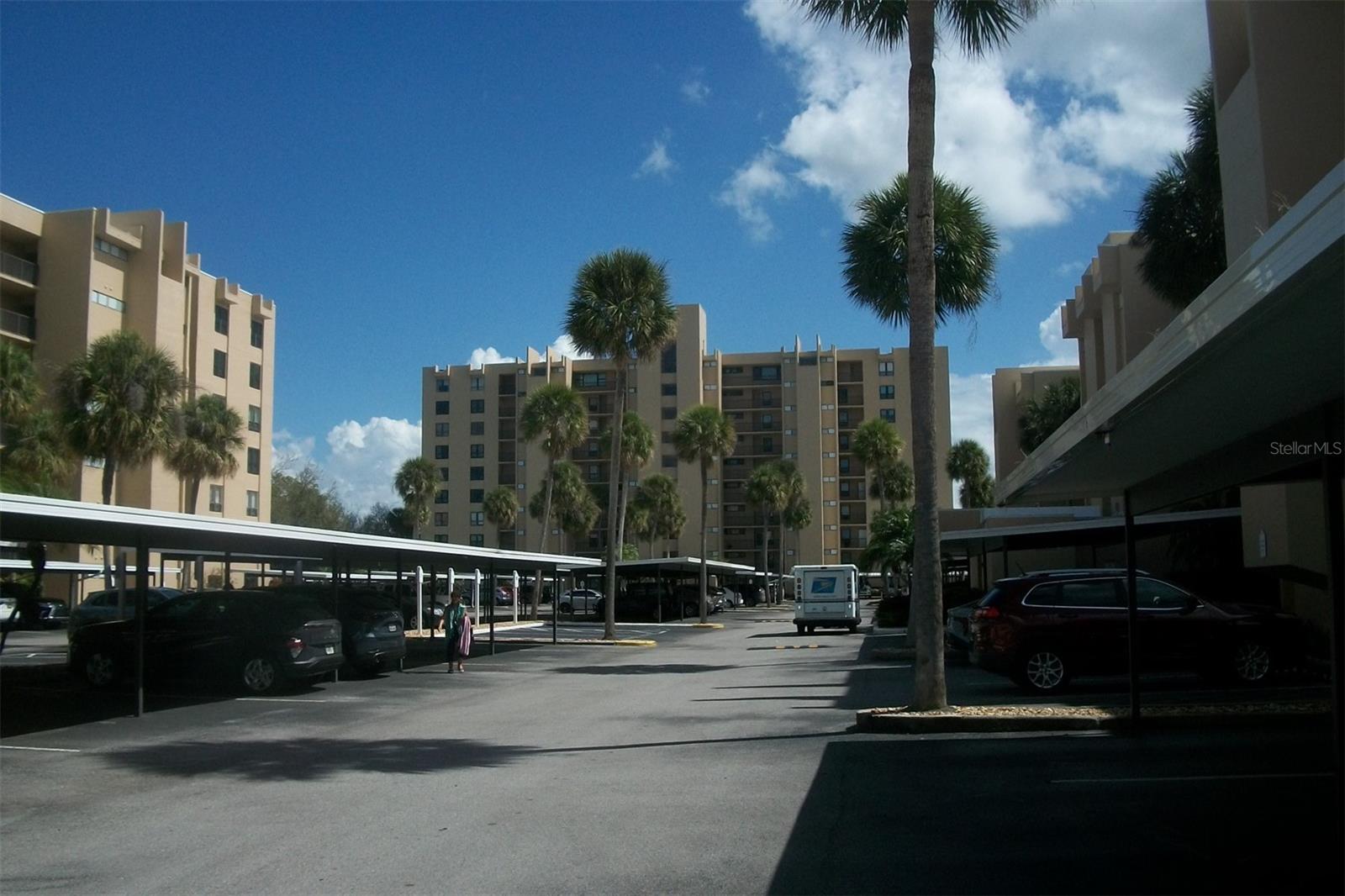 Condo in Building straight ahead, Second Floor Corner Unit overlooking Water and Golf Course