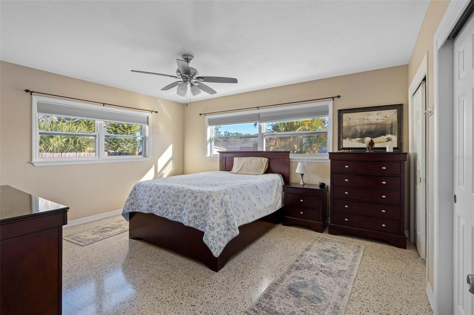 ... Master  Bedroom ..  Polished Terrazzo Floors . All New Windows - Doors -Ceiling Fan -Trim..
