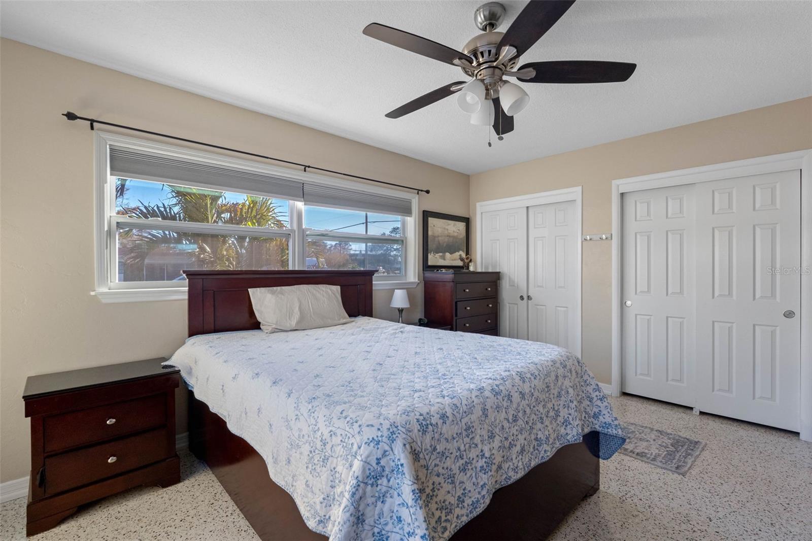 ... Master Bedroom - New Windows - Ceiling Fans - Doors - Polished Terrazzo Floors. Ten Foot run of Closet space.