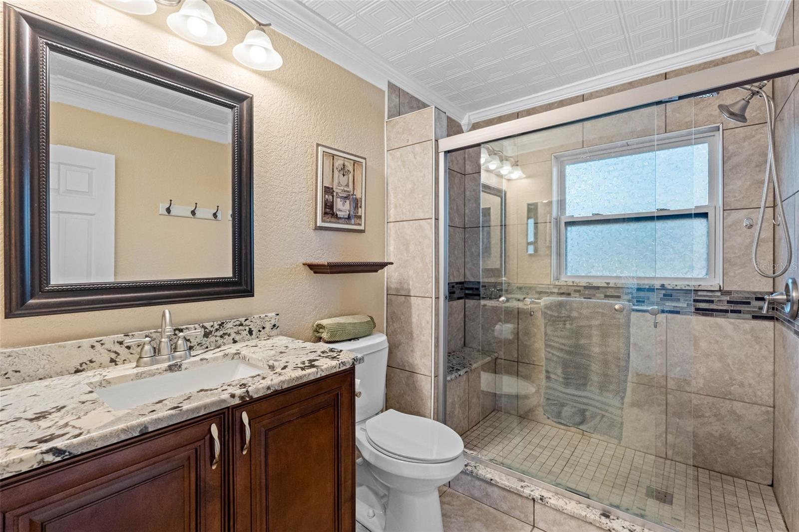 .. Bathroom #1 By Bedrooms.. New Vanity - New Toilet - New Tile..