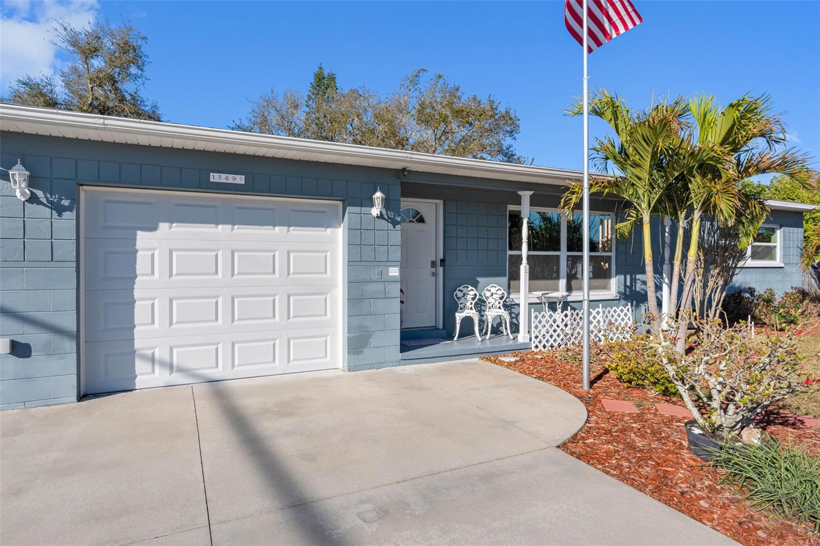 .. New Garage Door Next To Entrance... Solid Block Home - Non Flood X Zone.. No Flood Insurance needed. High Ground. Complete remodel 3 /4 years ago inside and out . New Roof - New Paint - New Floors - New Windows - All Done.