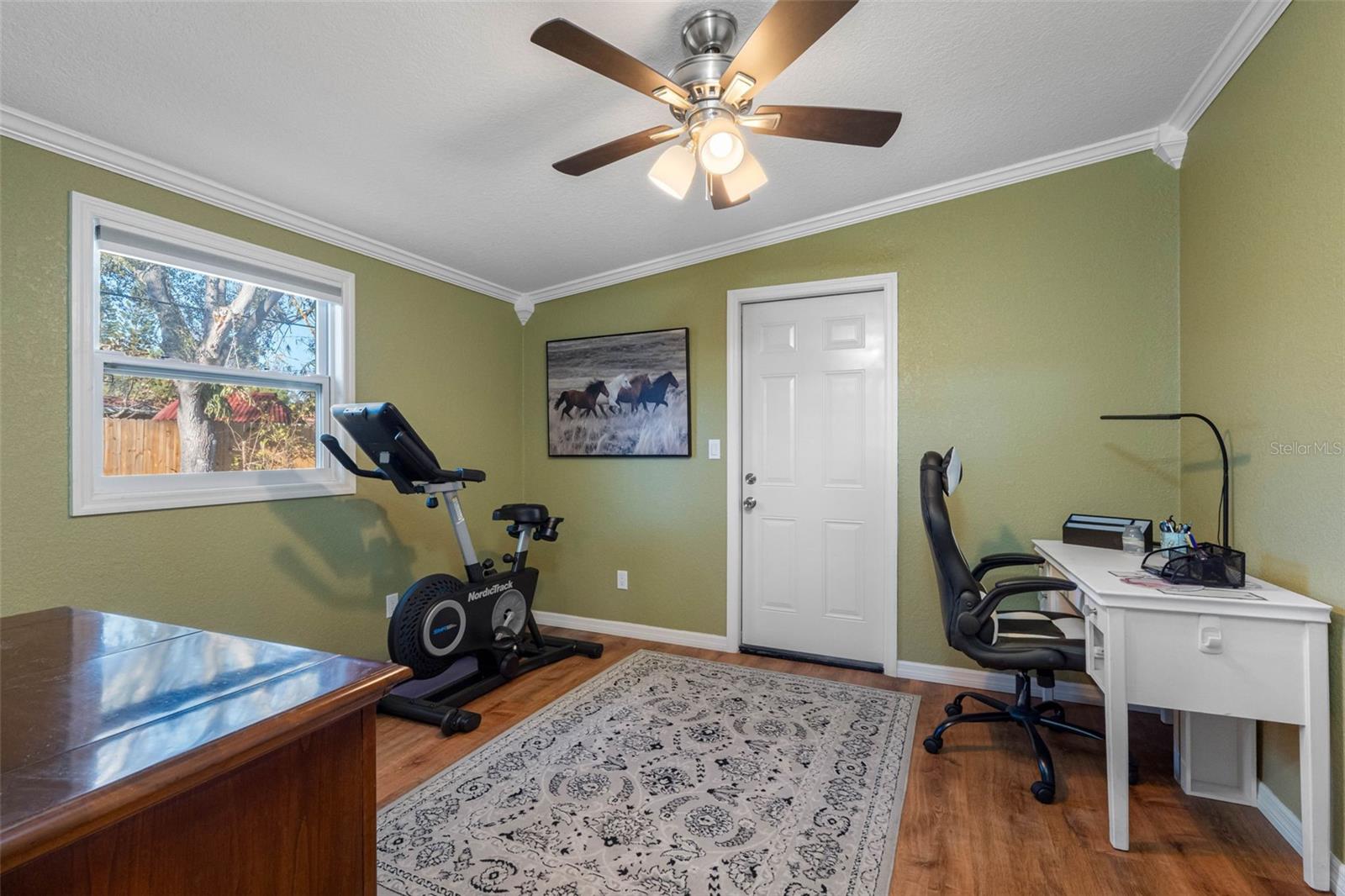 ...Shot #1 Large  Home Office 12.4 X 13.10... Bathroom #2 is Behind Camera.. 6 Panel Door Leads to Back Yard.. This Room Could be another Sleeping area if Needed.