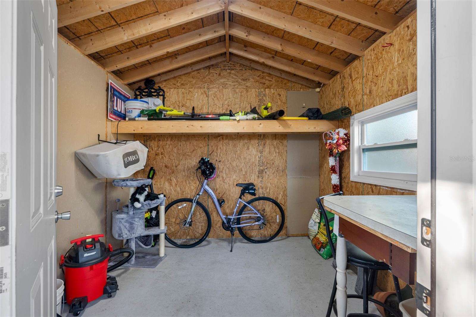 ... Inside She Shed.. Plenty of storage Space on this Property..