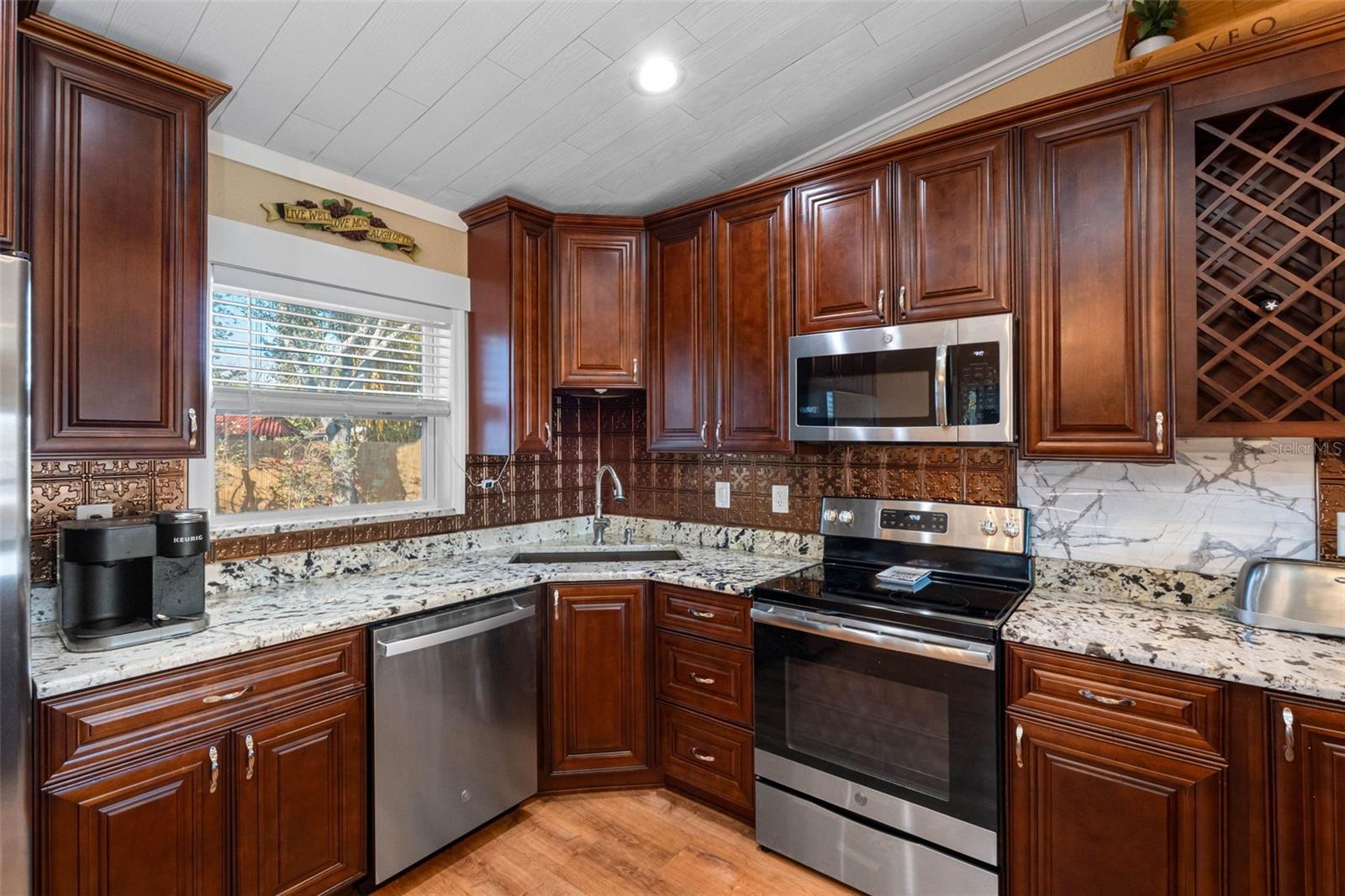 Kitchen Shot #4... Vaulted Ceilings.. New Kitchen Window by Sink with Views of Back Yard..