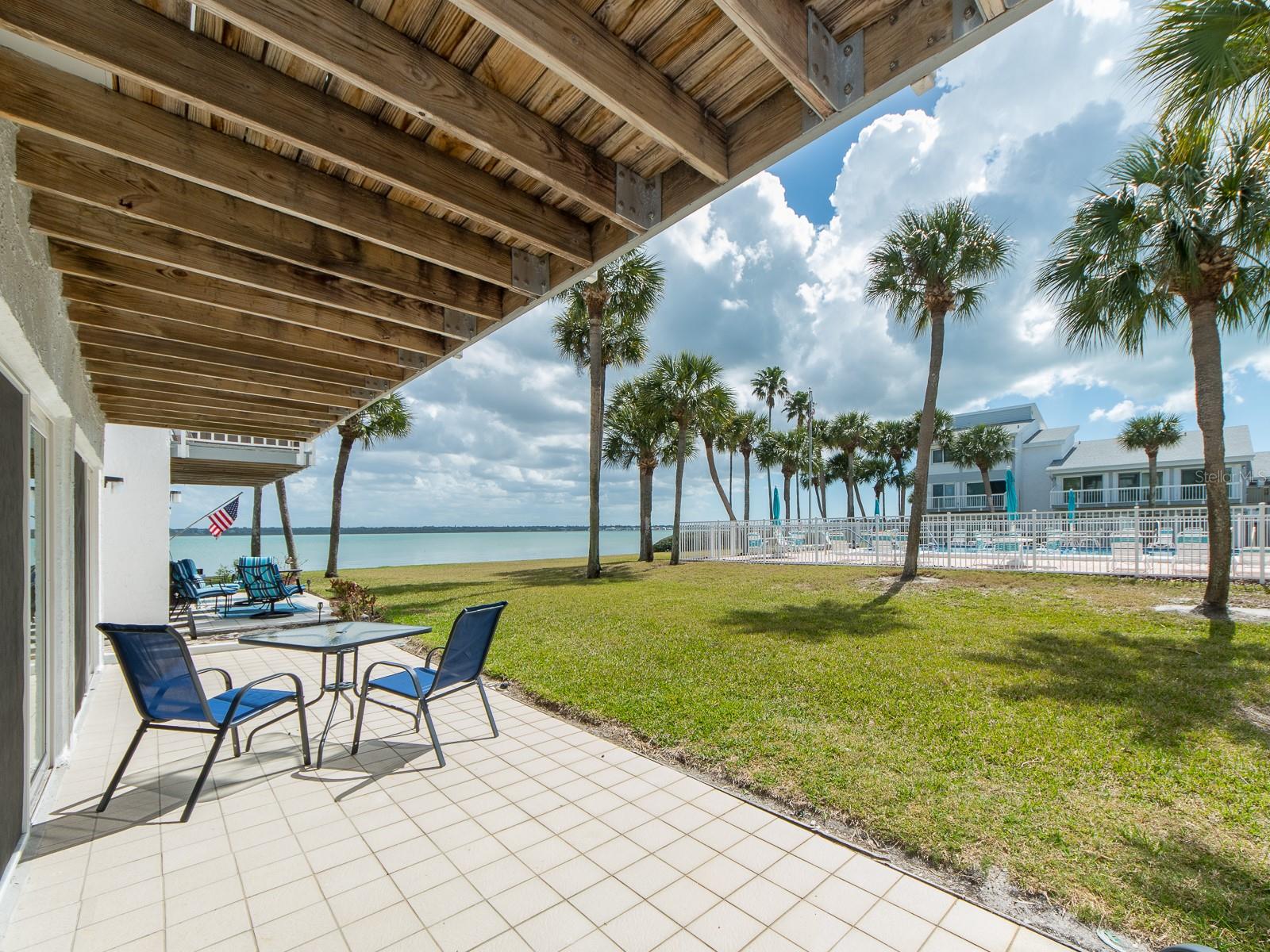 Watch dolphins from your private patio.