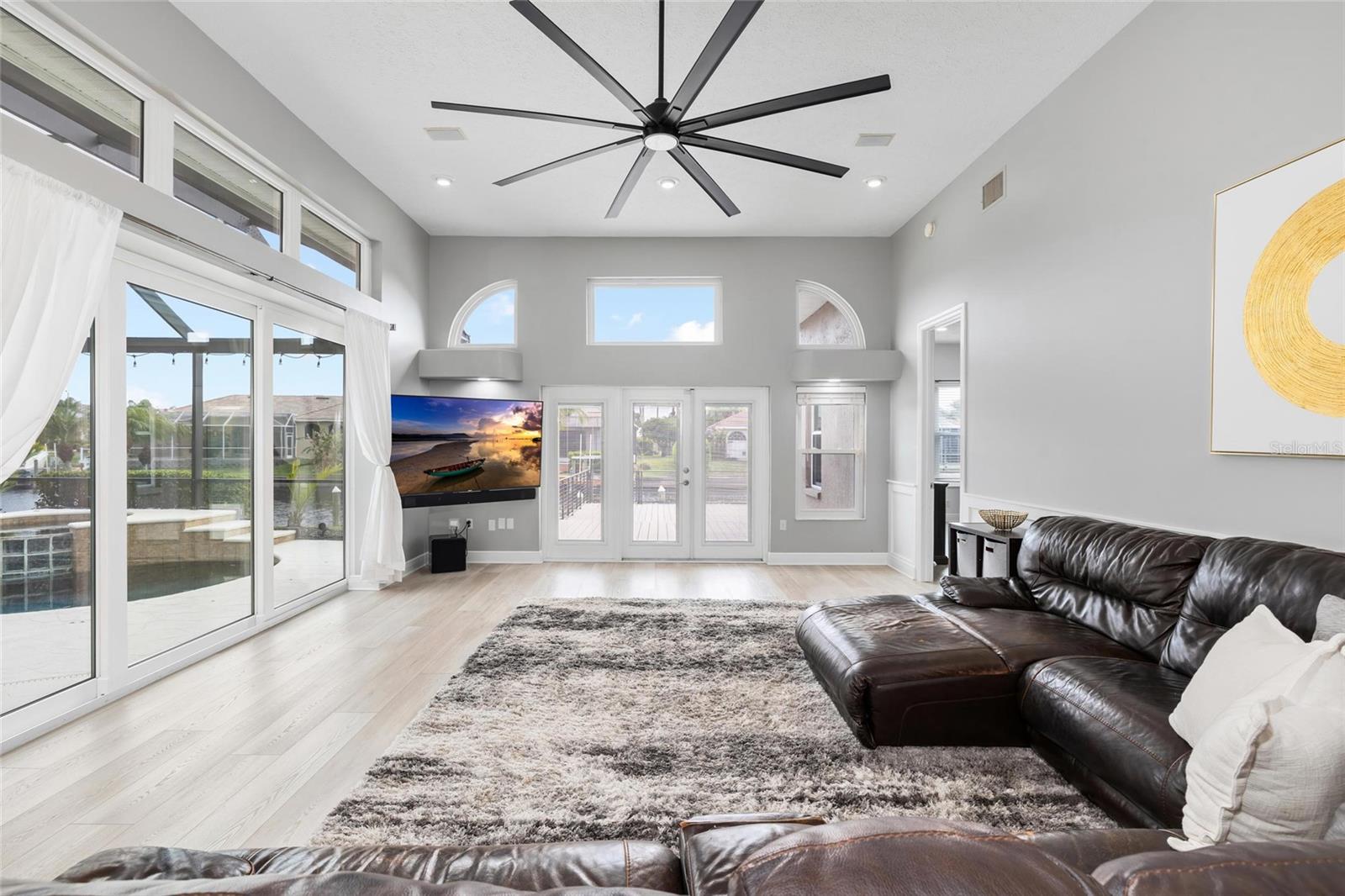 Family Room off of Kitchen with Sliders to Lanai/Pool