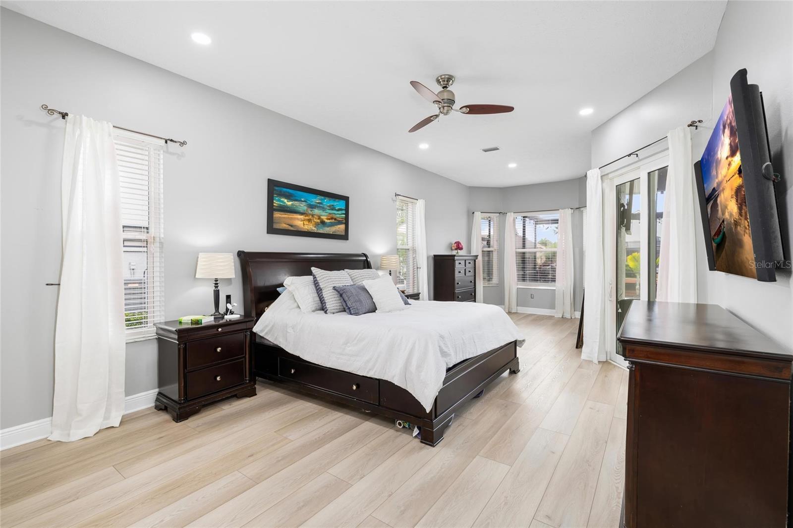 Master Suite with Sitting Area and Sliders to Lanai/Pool